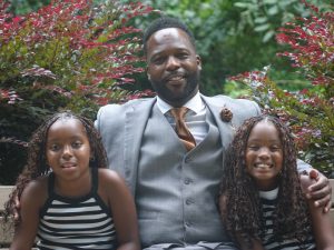 Greensboro, North Carolina candidate for mayor Mark Cummings with his daughters.